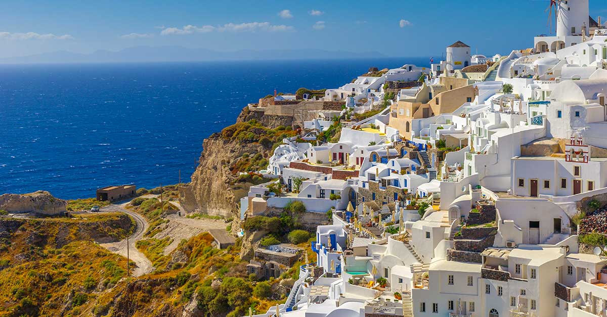Beach wedding in Santorini Greece – ceremony overlooking the caldera and the sunset