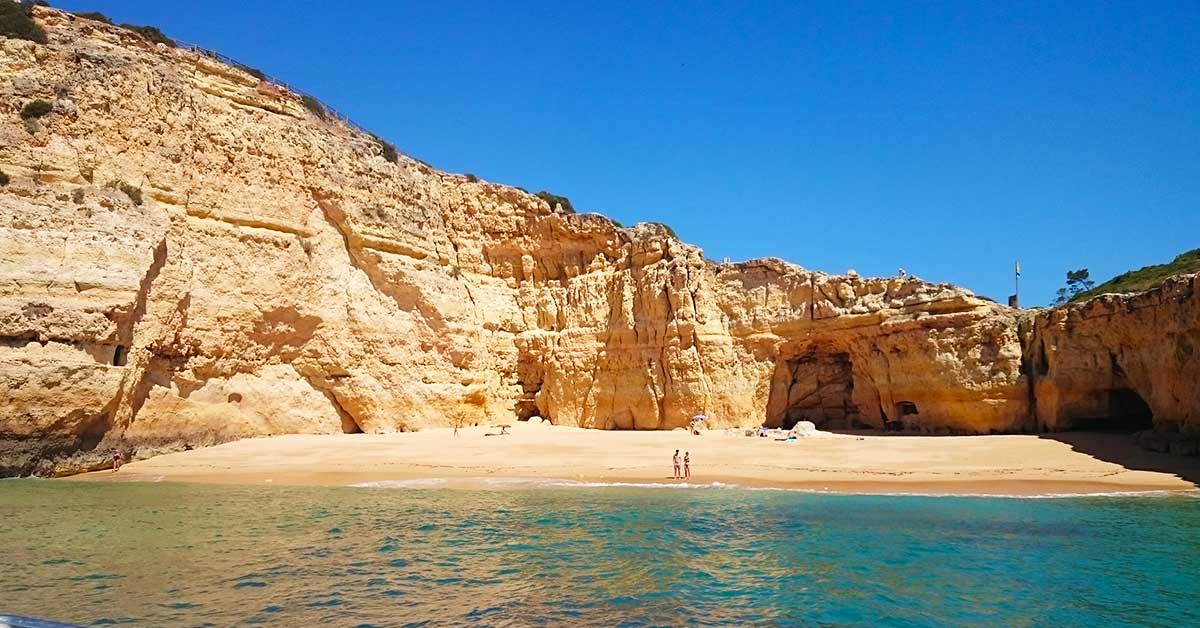 Praia do Carvalho, accessed through a tunnel carved into the rock, near Carvoeiro