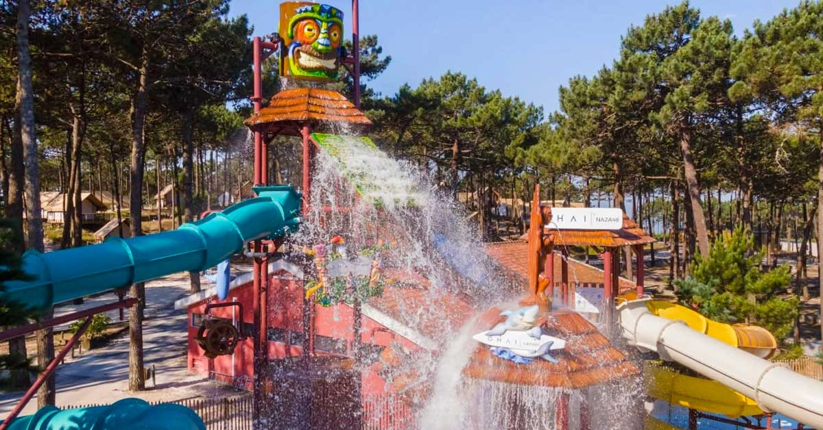 OHAI Nazaré Water Park – repurposed containers and slides beside the sea